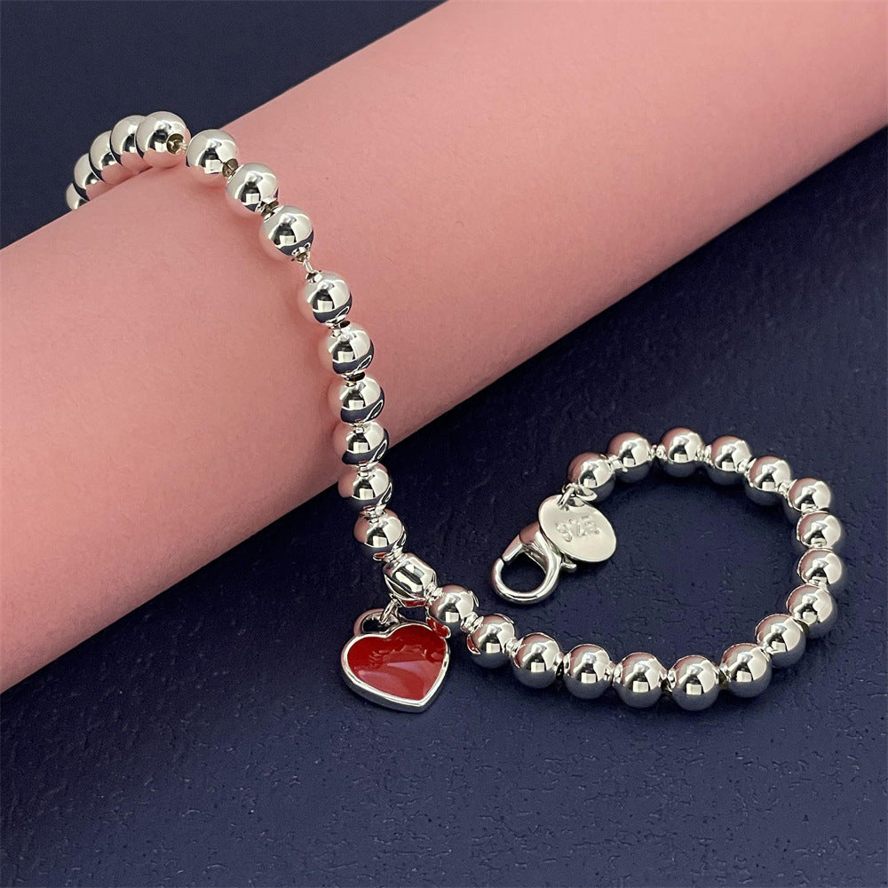 Bracciale con cuore rosso